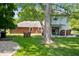 Expansive backyard with a mix of lawn and landscaping, highlighting outdoor space for entertaining or relaxing at 106 N Jamalee Way, Pendleton, IN 46064