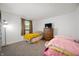 Cozy bedroom featuring a twin bed, dresser, and ample natural light at 106 N Jamalee Way, Pendleton, IN 46064