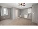 Comfortable bedroom featuring two windows and neutral colored walls at 106 N Jamalee Way, Pendleton, IN 46064