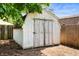 Outdoor shed with aged, weathered appearance, offering storage space and functionality to the property at 106 N Jamalee Way, Pendleton, IN 46064