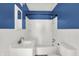 Bathroom featuring a vanity, mirror, toilet, and shower-tub combination at 11 14Th St, Franklin, IN 46131