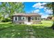 Charming one-story home with a well-maintained front yard and stone walkway at 11 14Th St, Franklin, IN 46131
