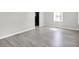 Cozy living room showcasing wood floors and a fresh, modern aesthetic at 11 14Th St, Franklin, IN 46131
