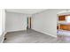 Open living space with wood-look flooring and seamless flow to the kitchen at 11 14Th St, Franklin, IN 46131
