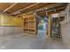Unfinished basement with lots of storage and exposed ceiling beams, perfect for storage at 11105 Deer Valley Dr, Indianapolis, IN 46229