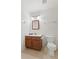 This bathroom features a wood vanity and a framed mirror at 11105 Deer Valley Dr, Indianapolis, IN 46229