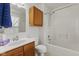 Bathroom featuring a vanity with cabinet, toilet, shower, and tub combo at 11105 Deer Valley Dr, Indianapolis, IN 46229
