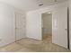 This bedroom features neutral carpeting and white doors with brass hardware at 11105 Deer Valley Dr, Indianapolis, IN 46229