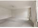 Spacious bedroom featuring plush carpet, ceiling fan, and plenty of natural light at 11105 Deer Valley Dr, Indianapolis, IN 46229