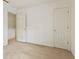 This bedroom features neutral carpeting and white doors with brass hardware at 11105 Deer Valley Dr, Indianapolis, IN 46229