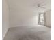 Expansive main bedroom featuring plush carpeting, neutral walls, and a ceiling fan at 11105 Deer Valley Dr, Indianapolis, IN 46229