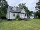 Inviting single-Gathering home with a lush green lawn and side yard at 114 S Green St, Brownsburg, IN 46112
