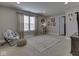 Cozy bedroom showcases large window, modern decor, and comfortable seating at 1215 W Curry Rd, Greenwood, IN 46143