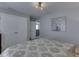 This bedroom features soft natural light, neutral walls, and carpet flooring at 1215 W Curry Rd, Greenwood, IN 46143