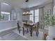 Stylish dining room features elegant lighting, modern decor, and large windows at 1215 W Curry Rd, Greenwood, IN 46143