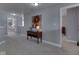 Upstairs hallway with a console table, neutral carpet, and a view to other rooms at 1215 W Curry Rd, Greenwood, IN 46143