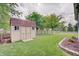Lush backyard featuring a storage shed at 12515 Traverse Pl, Fishers, IN 46038