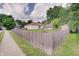 Charming home featuring a large, fenced backyard and a cozy sunroom, perfect for outdoor living and relaxation at 12515 Traverse Pl, Fishers, IN 46038