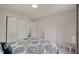 Bright bedroom features a closet, a floral comforter, and neutral walls at 12515 Traverse Pl, Fishers, IN 46038
