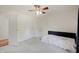 Bright bedroom with a ceiling fan, double closet, and neutral walls at 12515 Traverse Pl, Fishers, IN 46038