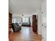 Spacious living room with hardwood floors, comfortable seating, and plenty of natural light at 12515 Traverse Pl, Fishers, IN 46038