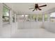 Bright sunroom with many windows and a ceiling fan at 12515 Traverse Pl, Fishers, IN 46038