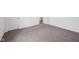 Carpeted bedroom with two doors at 1304 Vera Blvd, Danville, IN 46122