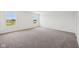 Bright bedroom with carpeted floors and two windows overlooking the neighborhood at 1304 Vera Blvd, Danville, IN 46122