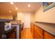 Basement bar area with ample counter space, wooden cabinets, and a convenient sink at 13910 Brightwater Dr, Fishers, IN 46038