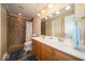 Bathroom with double sinks, a walk-in shower, and ample counter space at 13910 Brightwater Dr, Fishers, IN 46038