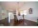 Bright dining room featuring a chandelier and large window for natural light at 13910 Brightwater Dr, Fishers, IN 46038