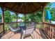A gazebo in the backyard features a table and chairs, perfect for enjoying the outdoor space at 13910 Brightwater Dr, Fishers, IN 46038