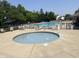 Community hot tub surrounded by lush green trees, offering a relaxing experience at 13910 Brightwater Dr, Fishers, IN 46038