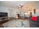 Spacious living area with hardwood floors, natural light, and an open floor plan at 13910 Brightwater Dr, Fishers, IN 46038