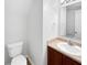 Bathroom featuring modern fixtures, a wood vanity, and neutral paint at 1525 Bluestem Dr, Greenwood, IN 46143