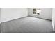 Bedroom featuring neutral carpet, and a large window for natural light at 1525 Bluestem Dr, Greenwood, IN 46143