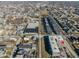 An aerial view of a neighborhood with varied home styles near commercial buildings, offering diverse living and shopping options at 1622 Cornell Ave, Indianapolis, IN 46202