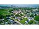 Aerial view of a neighborhood near a bustling city filled with lush greenery and diverse housing options at 1622 Cornell Ave, Indianapolis, IN 46202