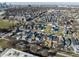 Aerial view of neighborhood with mix of charming homes and city skyline in distance at 1622 Cornell Ave, Indianapolis, IN 46202