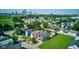 A neighborhood aerial captures a diverse residential area with a mix of homes and city skyline views at 1622 Cornell Ave, Indianapolis, IN 46202