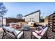 Backyard patio with comfortable seating and a fire pit, perfect for outdoor gatherings at 1622 Cornell Ave, Indianapolis, IN 46202