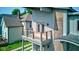 This modern house features a second-story balcony with steel cable railings at 1622 Cornell Ave, Indianapolis, IN 46202