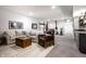 Finished basement with a comfy sofa, exercise equipment, and a mini-bar area for entertaining at 1622 Cornell Ave, Indianapolis, IN 46202