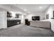 Spacious finished basement with a bar area and comfortable seating, perfect for relaxing and entertaining at 1622 Cornell Ave, Indianapolis, IN 46202