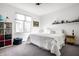 Bright bedroom with natural light, neutral walls, and minimalist decor for a calm and relaxing atmosphere at 1622 Cornell Ave, Indianapolis, IN 46202