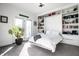 Bright bedroom with built-in shelves and a Murphy bed at 1622 Cornell Ave, Indianapolis, IN 46202