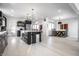Modern kitchen with dark cabinetry, stainless appliances, central island, and open layout for easy living and entertaining at 1622 Cornell Ave, Indianapolis, IN 46202