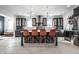 Contemporary kitchen featuring sleek countertops, stylish island seating, stainless steel appliances, and modern lighting at 1622 Cornell Ave, Indianapolis, IN 46202