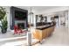 Bright and airy living room with modern decor, fireplace, and an open layout connecting to the kitchen and dining areas at 1622 Cornell Ave, Indianapolis, IN 46202