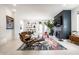 Bright living room showcasing modern furnishings, sleek fireplace, open floor plan, and a comfortable seating area at 1622 Cornell Ave, Indianapolis, IN 46202